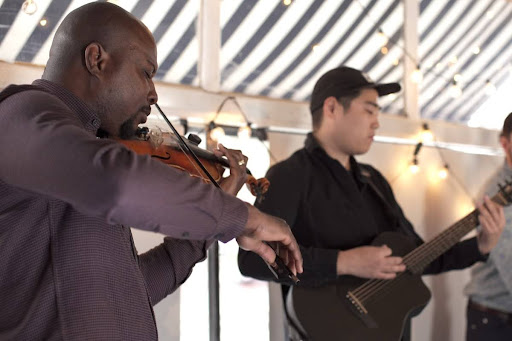 gigging musician playing with a codabow