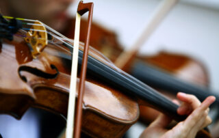 close up of a violin being played